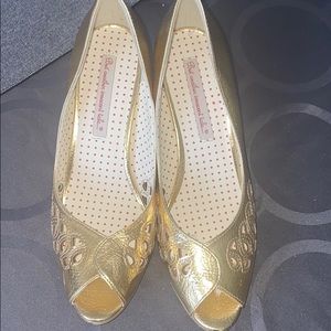 Gold peep toe shoes